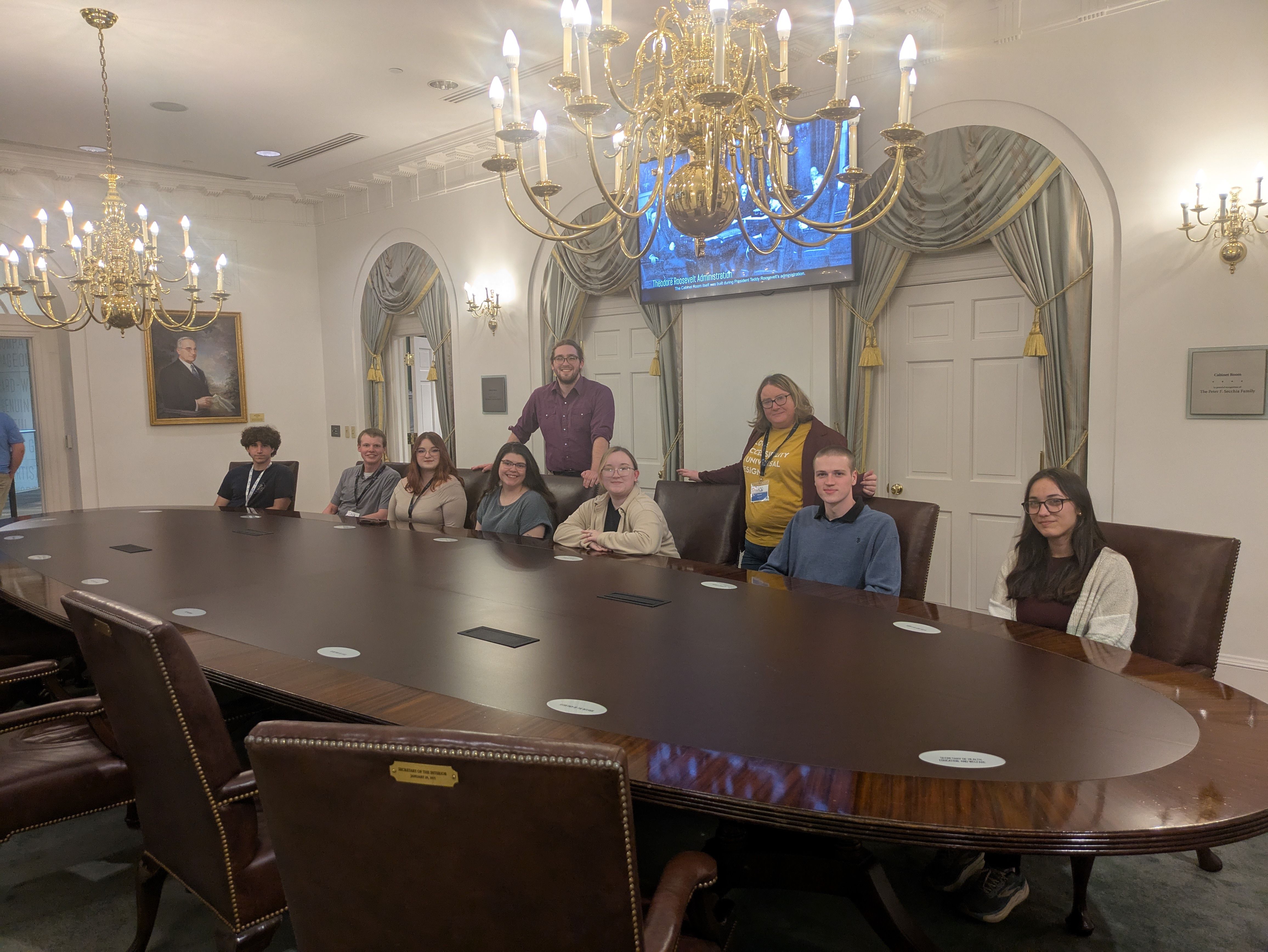 Me with a group of my students sitting in the Gerald Ford Cabinet Room at the Gerald Ford Museum